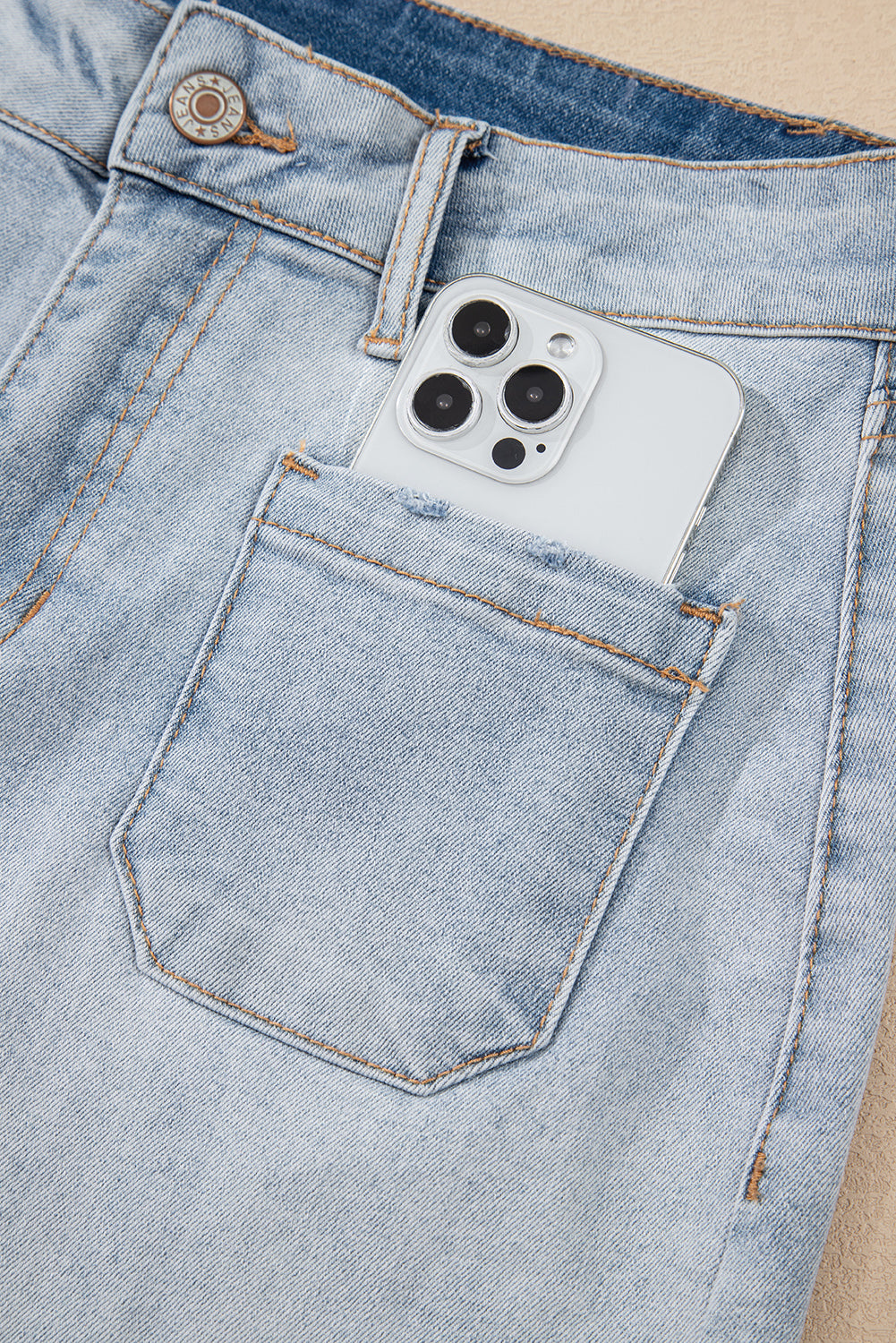 Light Wash High Rise Distressed Denim Shorts